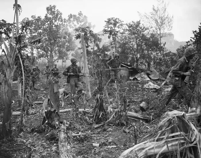 Framed Print : Marines Move Through Rubble