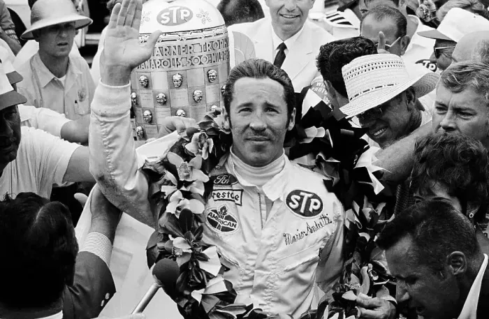 Framed Print : Mario Andretti Bedecked With Flowers Framed Print : Mario Andretti Bedecked With Flowers