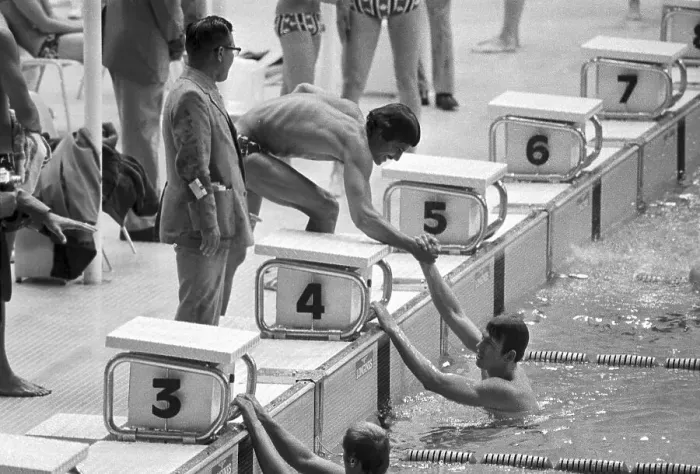 Framed Print : Mark Spitz Shaking Teammate's Hand Framed Print : Mark Spitz Shaking Teammate's Hand