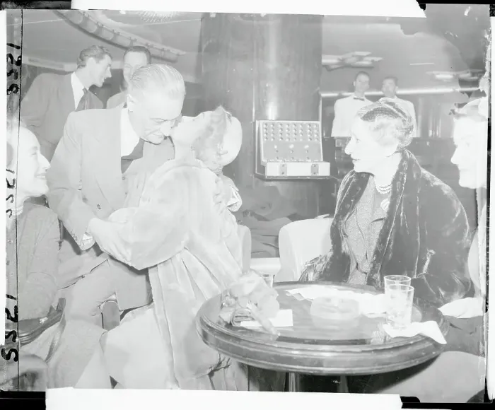 Framed Print : Marlene Dietrich Giving Kiss to Henri Bonnet Framed Print : Marlene Dietrich Giving Kiss to Henri Bonnet