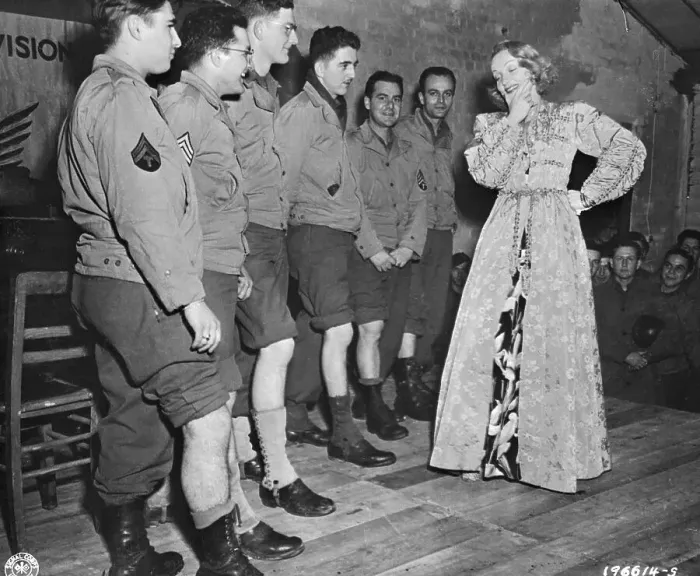 Framed Print : Marlene Dietrich Looking at Soldiers Legs