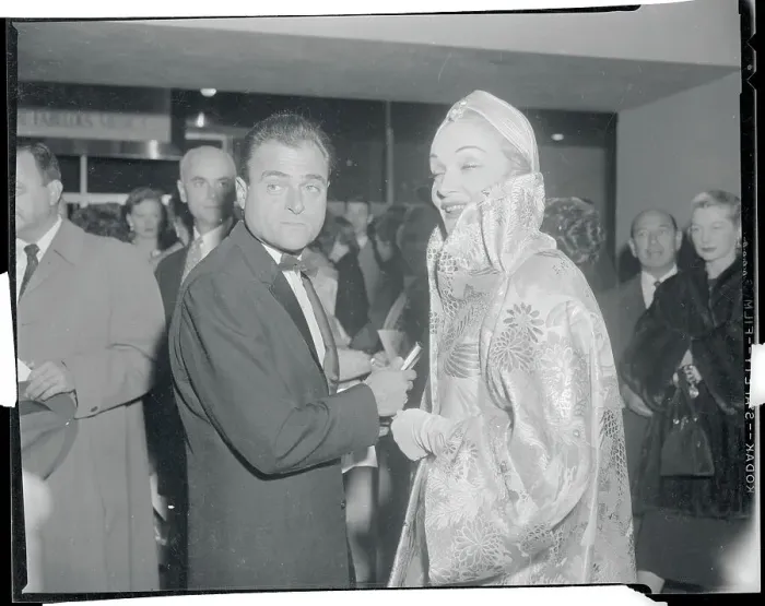Framed Print : Marlene Dietrich and Mike Todd Pausing During Premiere