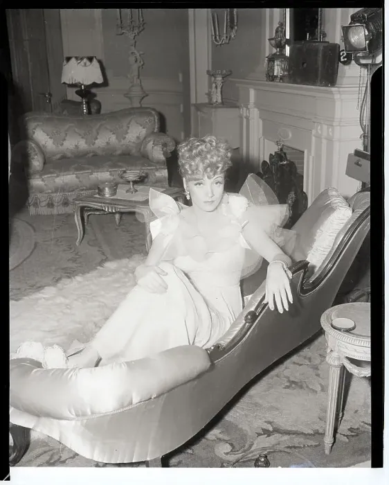 Framed Print : Marlene Dietrich Seated On Couch Framed Print : Marlene Dietrich Seated On Couch