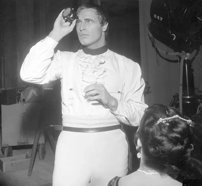 Framed Print : Marlon Brando Inspecting Slides Framed Print : Marlon Brando Inspecting Slides