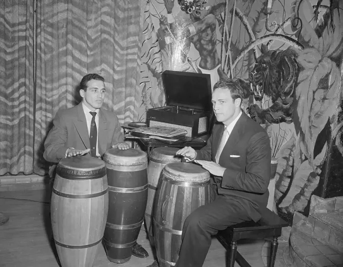 Framed Print : Marlon Brando Playing the Bongos Framed Print : Marlon Brando Playing the Bongos