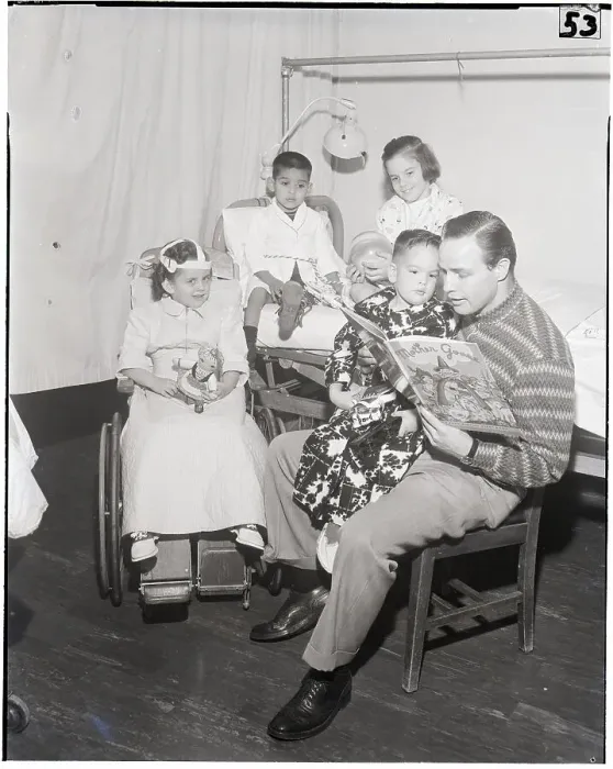 Framed Print : Marlon Brando Reading to Children with Polio