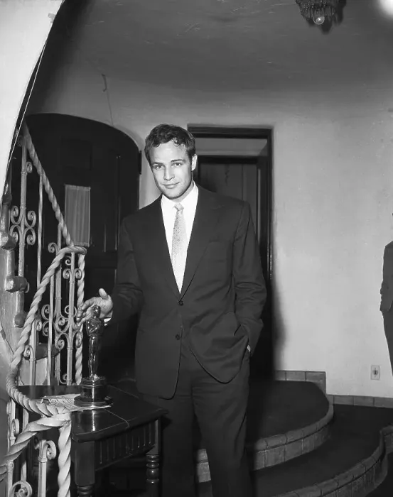 Framed Print : Marlon Brando Standing with His Oscar Framed Print : Marlon Brando Standing with His Oscar