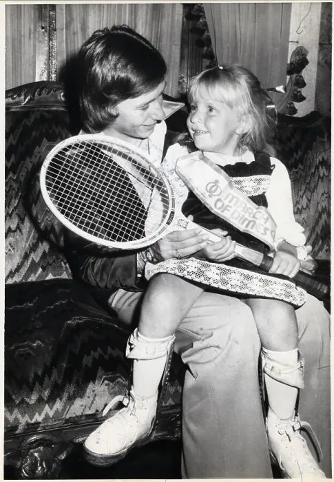 Framed Print : Martina Navratilova Holds March of Dimes Girl Framed Print : Martina Navratilova Holds March of Dimes Girl