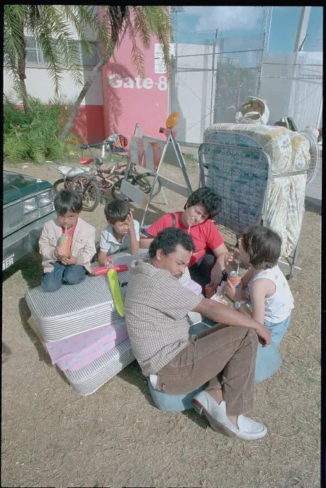 Framed Print : Martinez Family Packing their Belongings Framed Print : Martinez Family Packing their Belongings