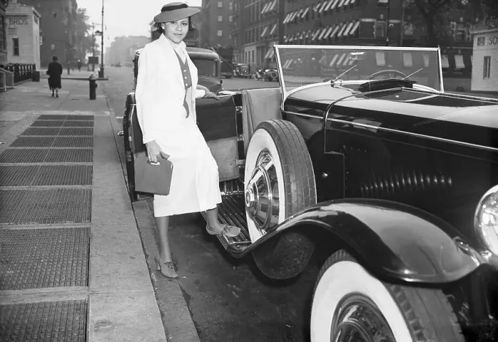 Framed Print : Marva Louis Stepping into Car