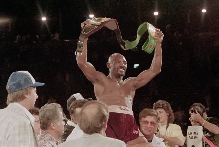 Framed Print : Marvin Hagler Holding a Championship Belt Framed Print : Marvin Hagler Holding a Championship Belt