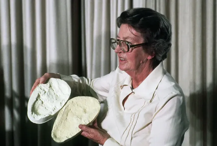 Framed Print : Mary Leakey Holding a Mold from a 3.6 Million Year Old Footprint Framed Print : Mary Leakey Holding a Mold from a 3.6 Million Year Old Footprint