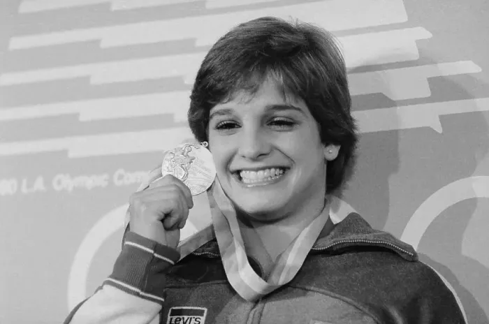 Framed Print : Mary Lou Retton Displaying Gold Medal Framed Print : Mary Lou Retton Displaying Gold Medal