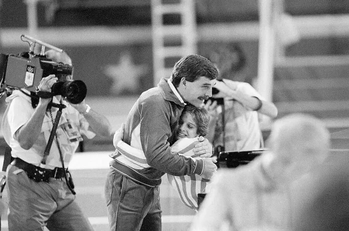 Framed Print : Mary Lou Retton Hugging One of Her Coaches Framed Print : Mary Lou Retton Hugging One of Her Coaches