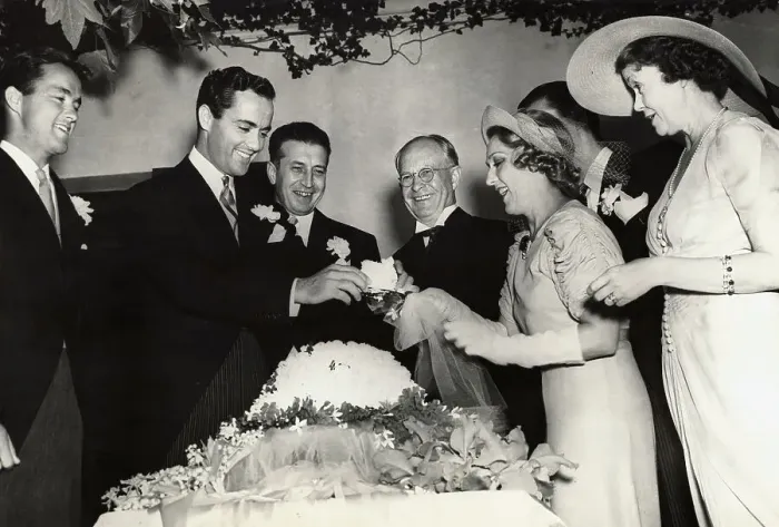 Framed Print : Mary Pickford and Buddy Rogers Cutting Wedding Cake