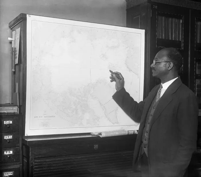 Framed Print : Matt Henson Looking At A Map Framed Print : Matt Henson Looking At A Map