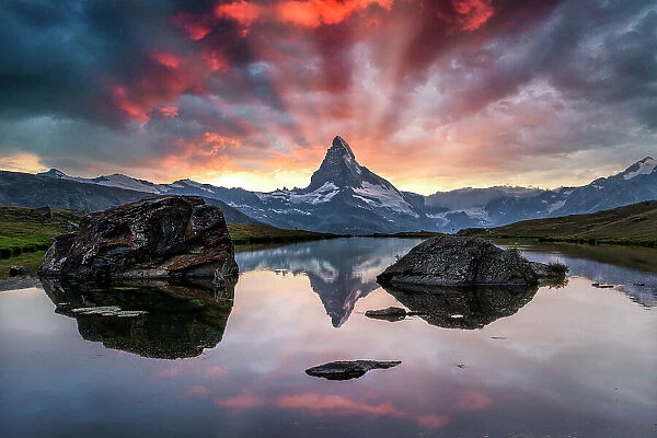 Matterhorn reflected in lake Stellisee at sunset. Zermatt, Valais Canton, Switzerland
