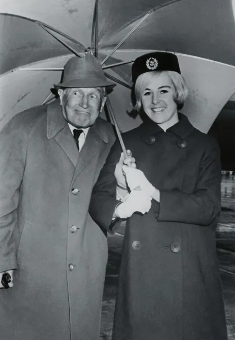 Framed Print : Maurice Chevalier Posing with a Flight Attendant Framed Print : Maurice Chevalier Posing with a Flight Attendant