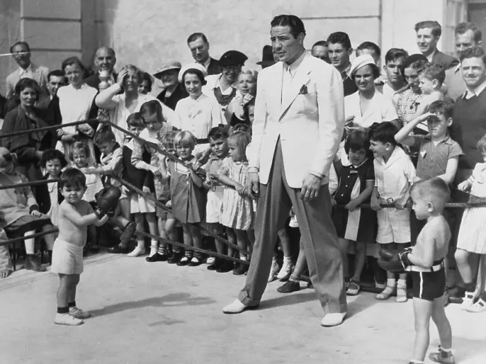 Framed Print : Max Baer Standing in Ring With Small Boys Framed Print : Max Baer Standing in Ring With Small Boys