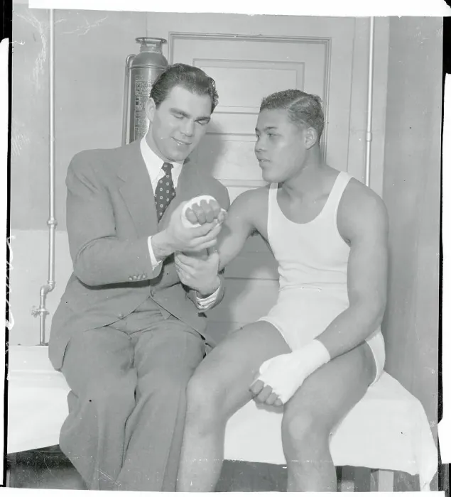 Framed Print : Max Schleming Showing Concern for Joe Louis Framed Print : Max Schleming Showing Concern for Joe Louis