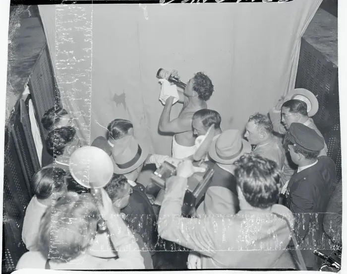 Framed Print : Max Schmeling Drinking a Bottle of Champagne Framed Print : Max Schmeling Drinking a Bottle of Champagne
