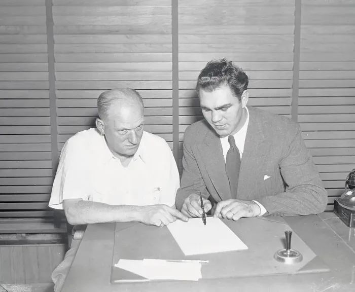 Framed Print : Max Schmeling Signing Contract with Mike Jacobs