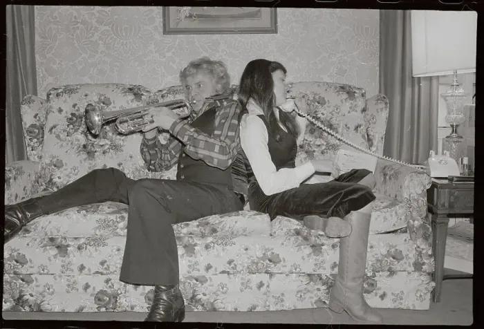 Framed Print : Maynard Ferguson With Trumpet Sitting With Daughter on Phone Framed Print : Maynard Ferguson With Trumpet Sitting With Daughter on Phone