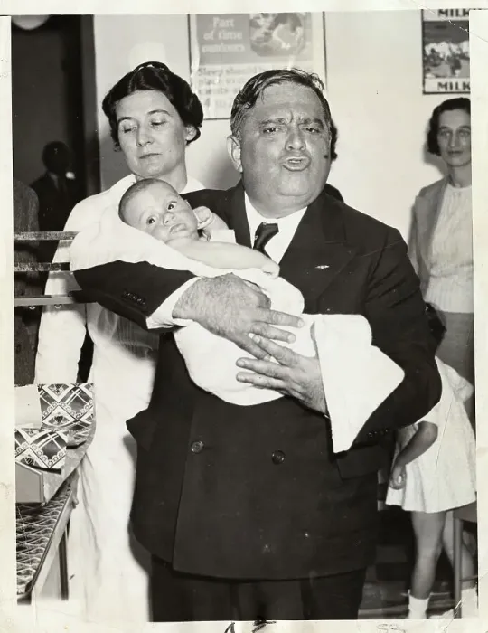 Framed Print : Mayor Fiorello LaGuardia Holding Baby Framed Print : Mayor Fiorello LaGuardia Holding Baby