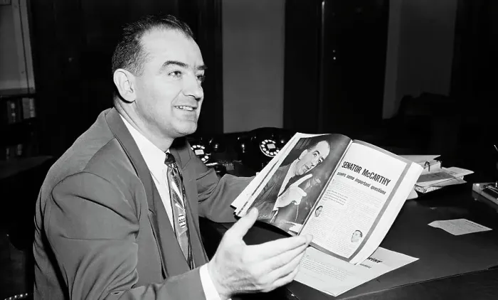 Framed Print : McCarthy Looking Over Article in Magazine Framed Print : McCarthy Looking Over Article in Magazine