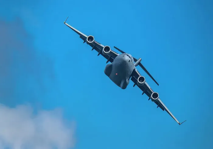 Framed Print : McDonnell Douglas / Boeing C-17 Globemaster III American Air Force cargo plane flying against sky