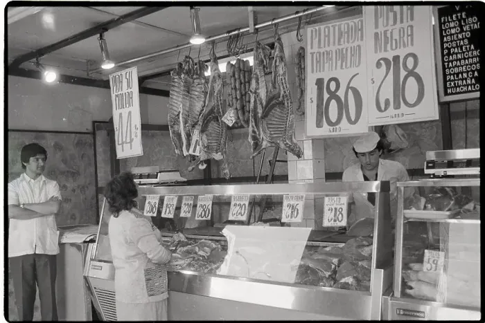Framed Print : Meat Market with Signs Displaying Prices Framed Print : Meat Market with Signs Displaying Prices