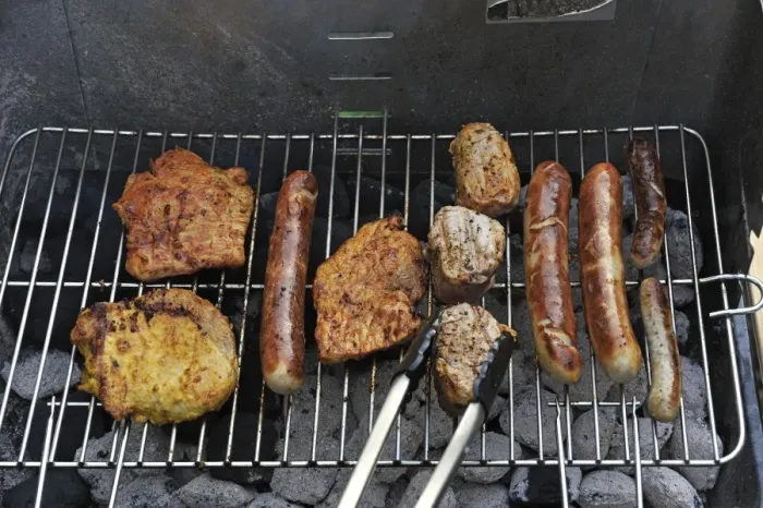 Framed Print : Meat and sausages or bratwursts on a grill, Germany Framed Print : Meat and sausages or bratwursts on a grill, Germany