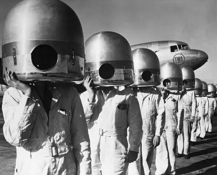 Framed Print : Mechanics with Propeller Hubs on Heads Framed Print : Mechanics with Propeller Hubs on Heads