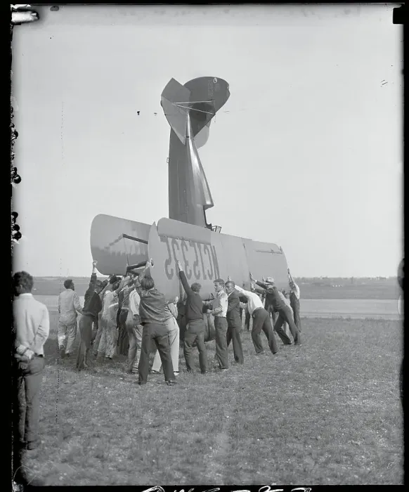 Framed Print : Mechanics Pushing Travel Plane Framed Print : Mechanics Pushing Travel Plane