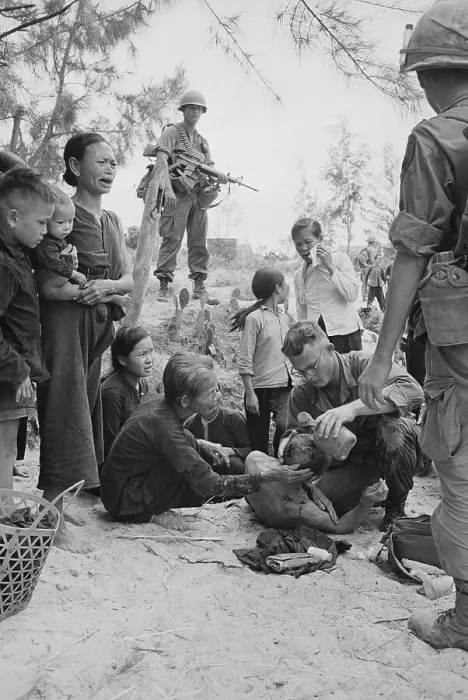 Framed Print : Medic Treating Wounded Vietnamese Framed Print : Medic Treating Wounded Vietnamese