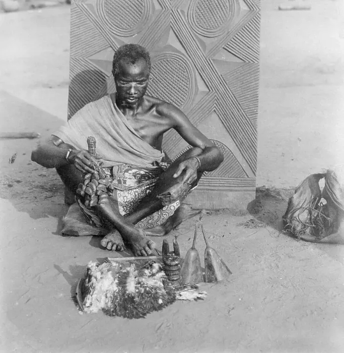 Framed Print : Medicine Man Sitting on Ground Framed Print : Medicine Man Sitting on Ground