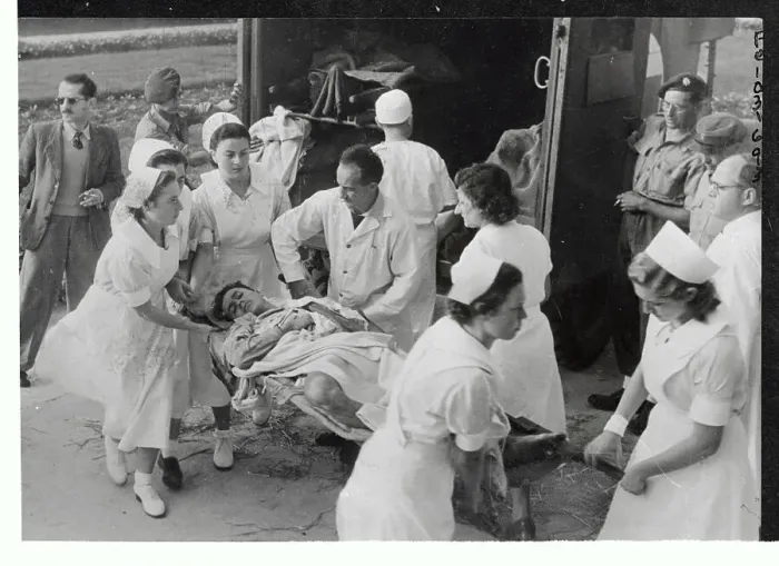 Framed Print : Medics Carrying Wounded Man on Stretcher Framed Print : Medics Carrying Wounded Man on Stretcher