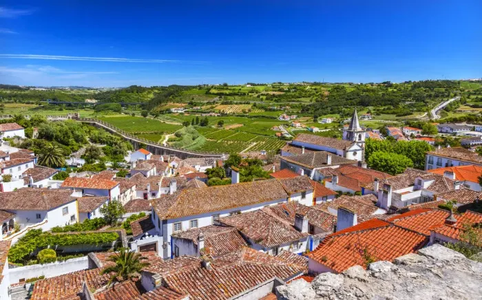Framed Print : Medieval town with fortified walls and Santa Maria church, Obidos, Portugal Framed Print : Medieval town with fortified walls and Santa Maria church, Obidos, Portugal