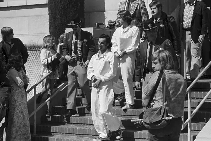 Framed Print : Members of Symbionese Liberation Army in Handcuffs Framed Print : Members of Symbionese Liberation Army in Handcuffs