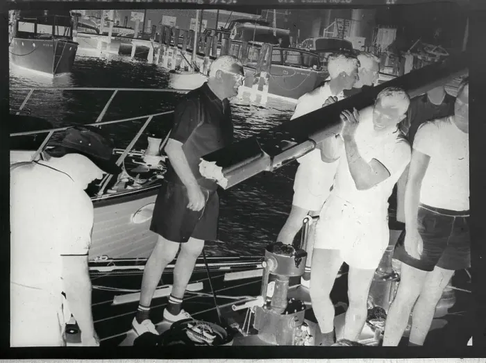 Framed Print : Men Carrying Boom Near Boat Dock Framed Print : Men Carrying Boom Near Boat Dock