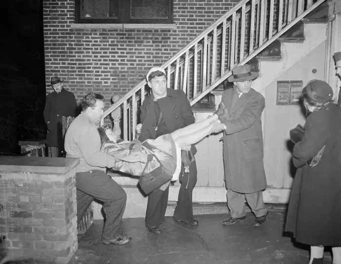 Framed Print : Men Carrying Unconscious Woman Framed Print : Men Carrying Unconscious Woman