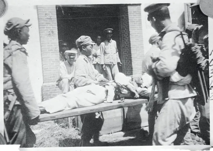 Framed Print : Men Carrying a Wounded Soldier on a Stretcher