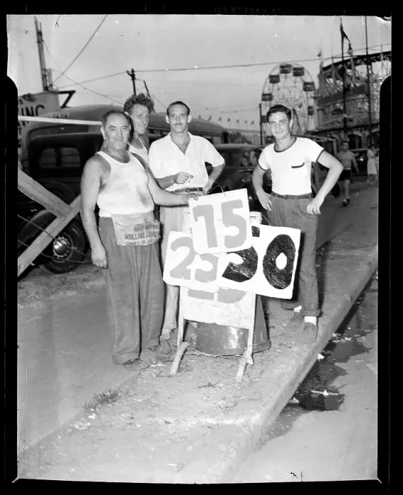 Framed Print : Men Changing Sign at Coney Island Framed Print : Men Changing Sign at Coney Island