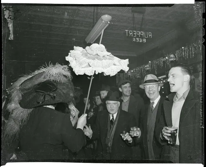 Framed Print : Men Cheering at Woman with Parasol Framed Print : Men Cheering at Woman with Parasol