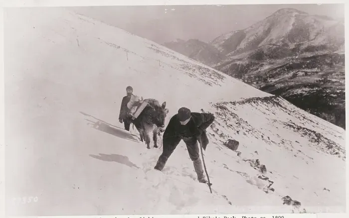 Framed Print : Two Men Climbing Mountain