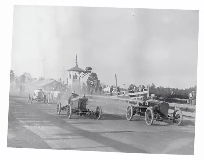 Framed Print : Men Competing in an Auto Race Framed Print : Men Competing in an Auto Race
