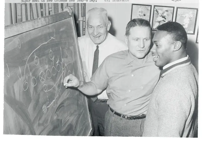Framed Print : Men Diagramming a Football Play Framed Print : Men Diagramming a Football Play
