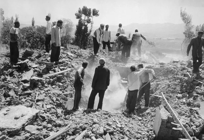 Framed Print : Men Dig For Victims In Earthquake Rubble Framed Print : Men Dig For Victims In Earthquake Rubble