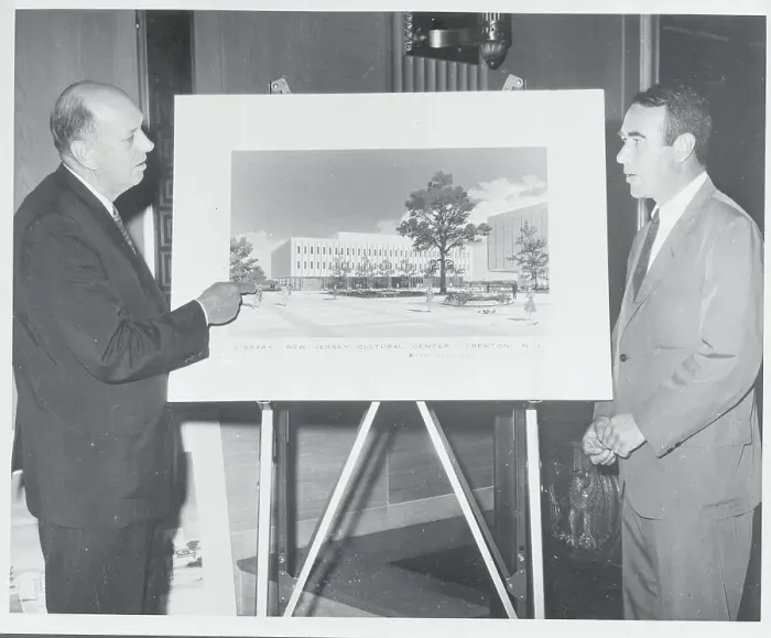 Framed Print : Men Discussing New Building Framed Print : Men Discussing New Building