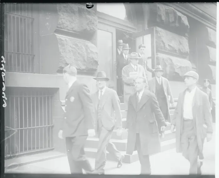 Framed Print : Men Exiting a Criminal Courts Building Framed Print : Men Exiting a Criminal Courts Building